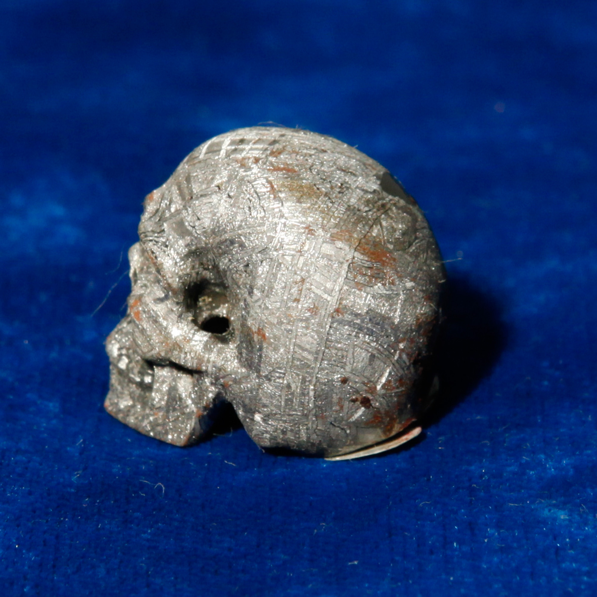Hand Carved Skull from Gibeon Meteorite #21 – 24.5 grams – House of Whitley
